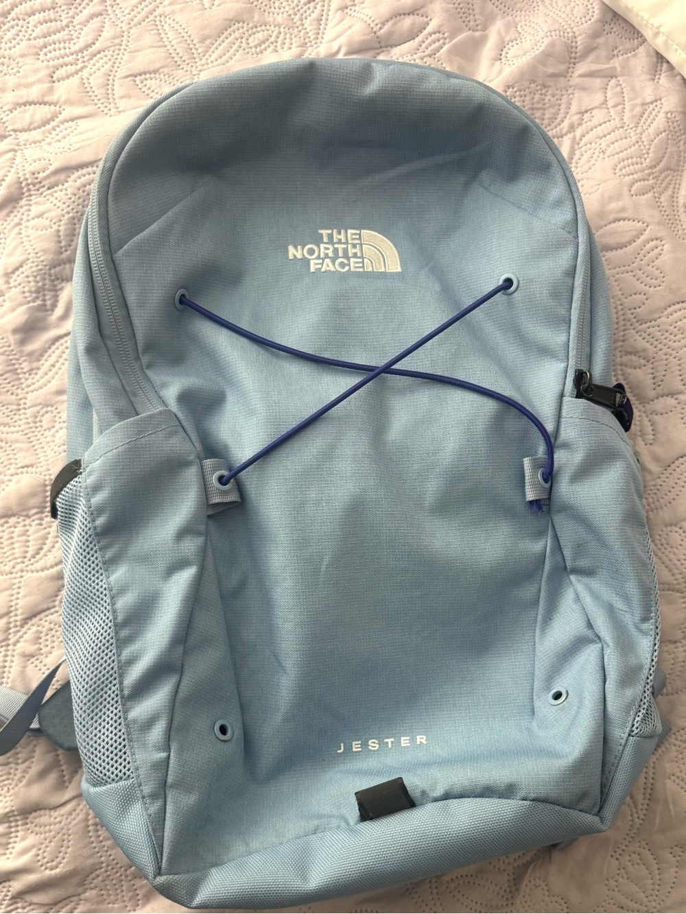 The North Face Light Blue Jester Backpack with Dark Blue Bungee